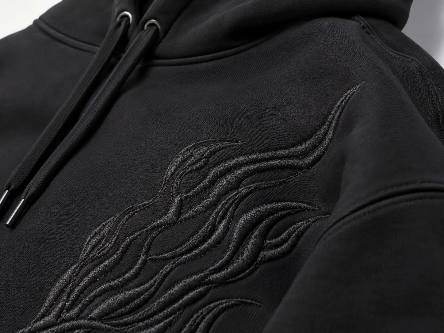 Embroidery and applique detail on heavyweight hoodie