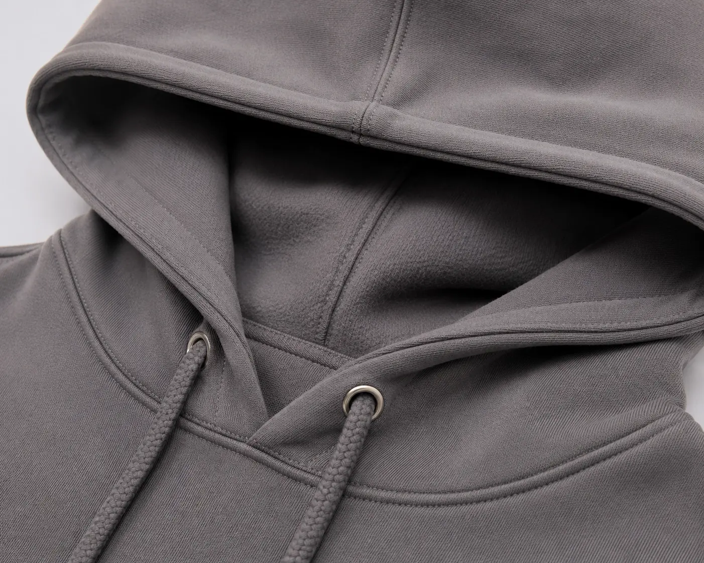 Pullover hoodie hood construction with drawstring and clean stitching