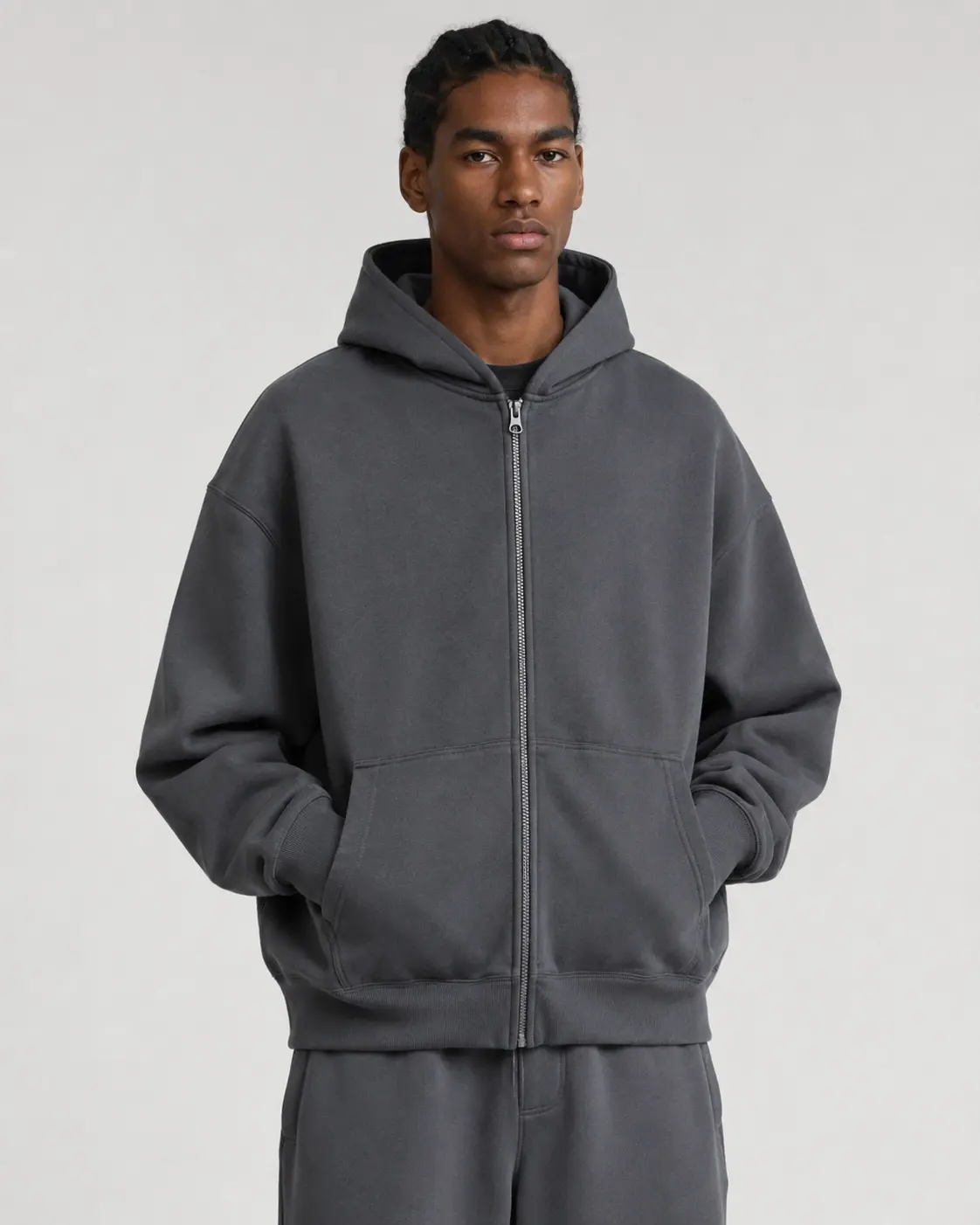 Oversized zip-up hoodie with dropped shoulders and streetwear fit