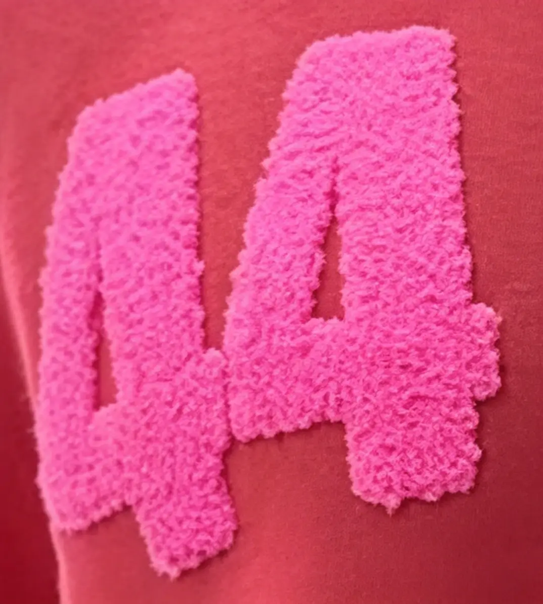 Towel embroidery for custom apparel texture