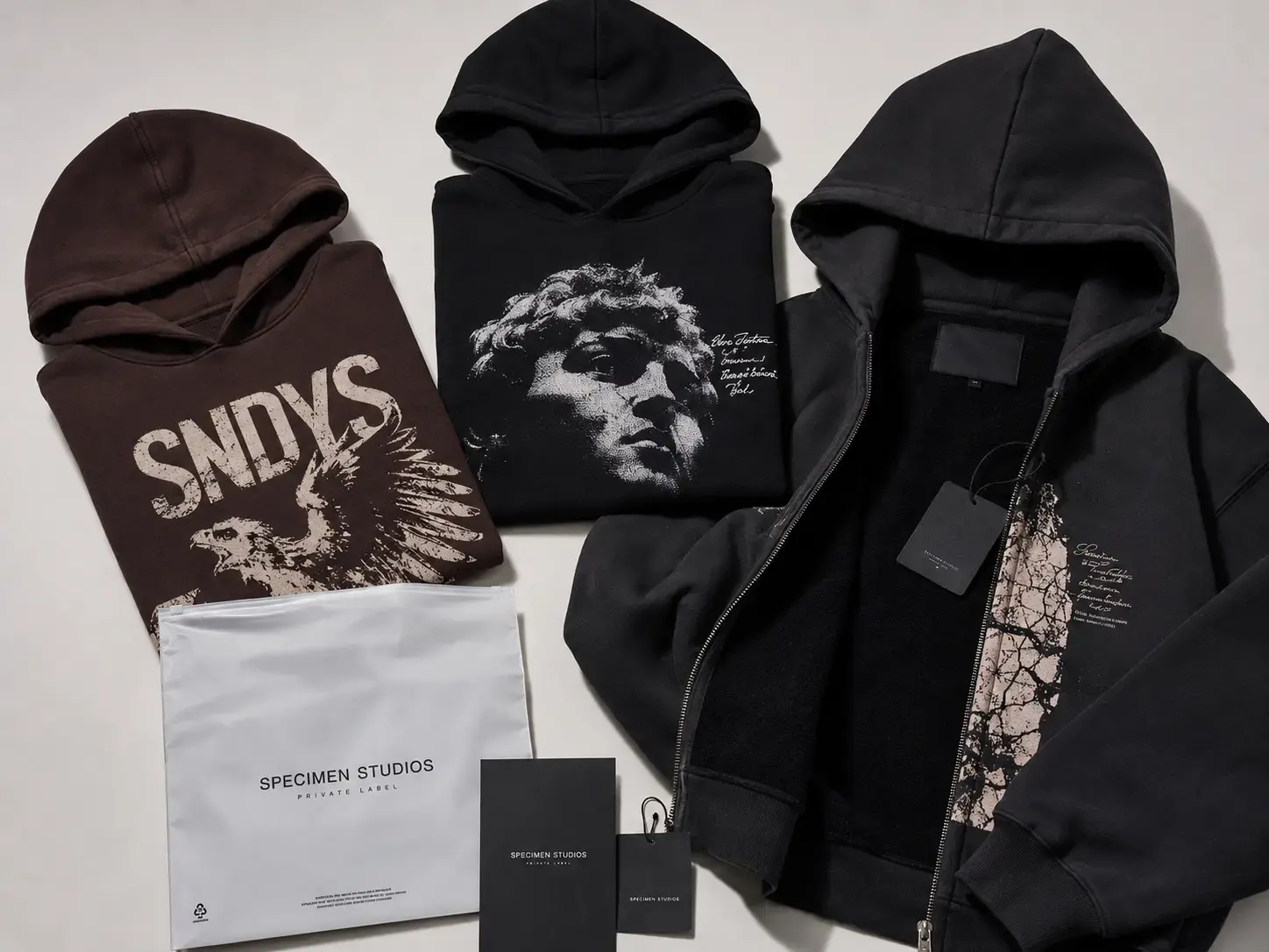 Private label graphic hoodies with custom tags and packaging