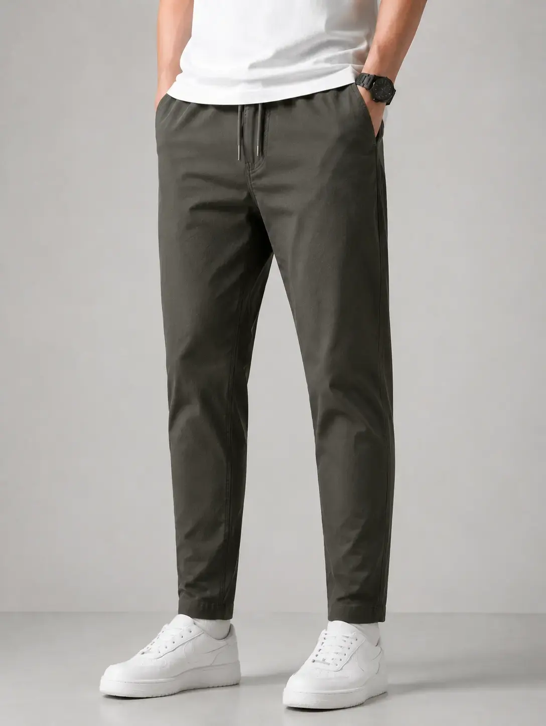 Tapered casual pants with clean hem opening and modern fit