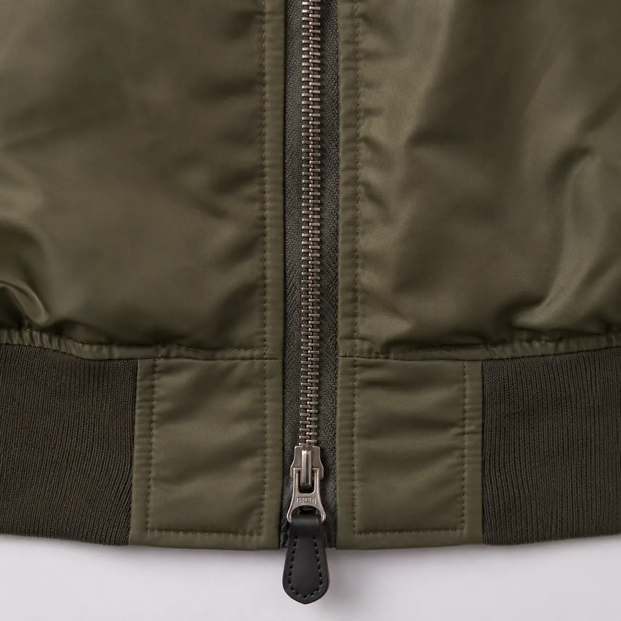 Front zipper construction detail for custom bomber jacket
