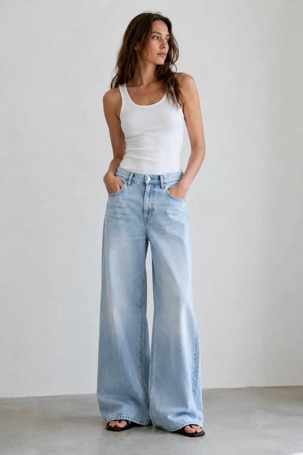 Custom light washed wide leg jeans with relaxed denim fit